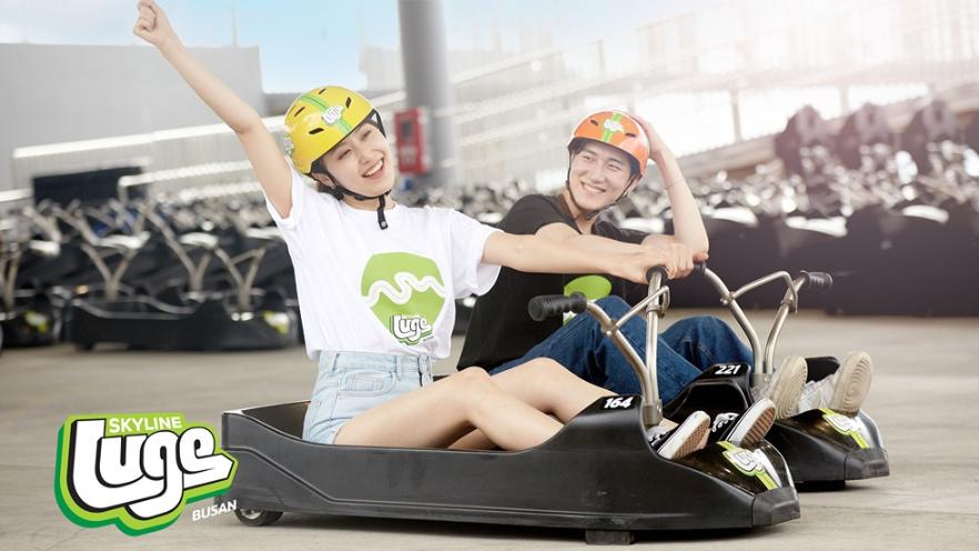 Experience the joy of racing down Skyline Luge Busan's winding tracks with friends and family surrounded by stunning scenery and excitement at every turn. Perfect for adventurers of all ages!